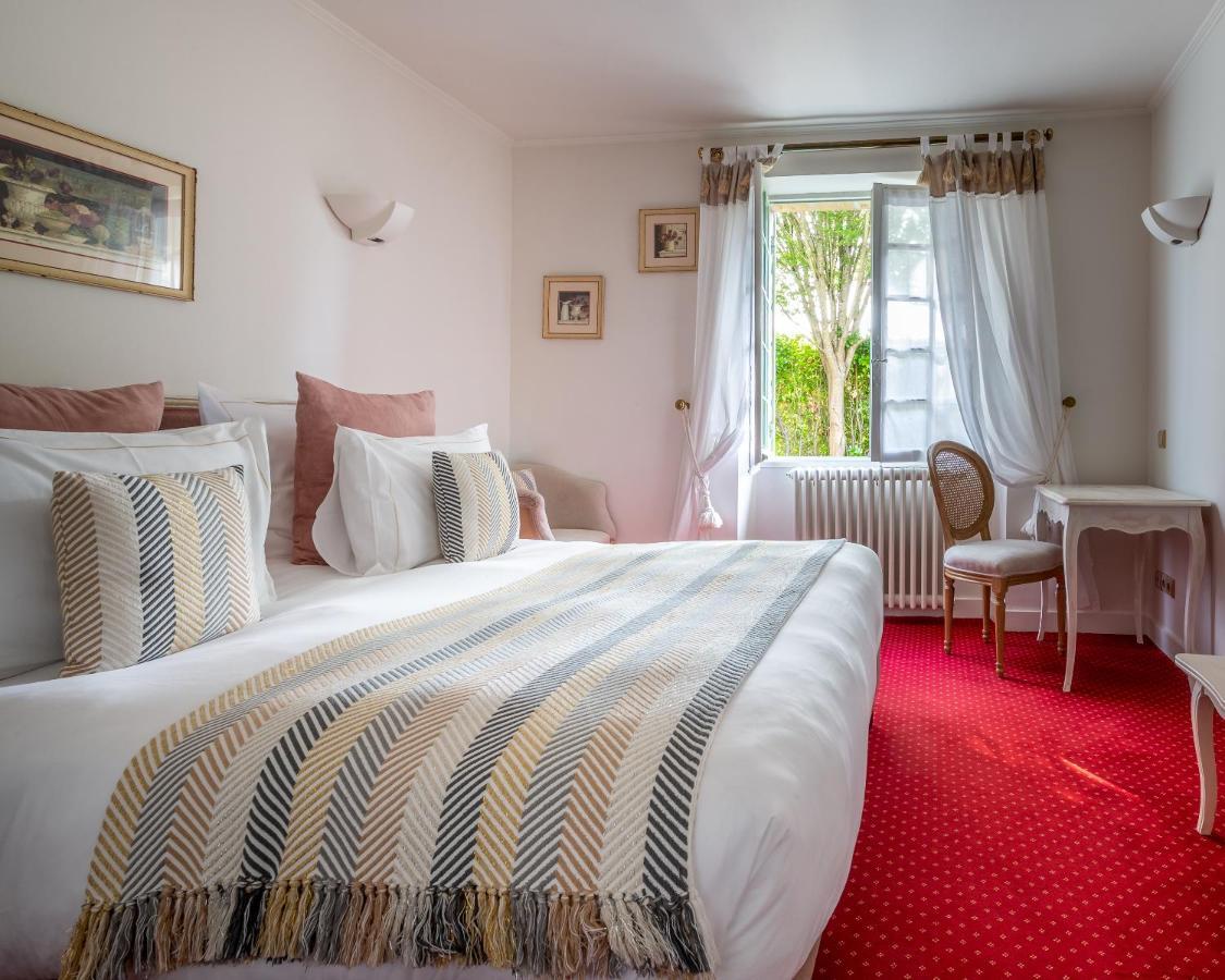 Hotel Restaurant Le Centenaire Les Eyzies Екстер'єр фото