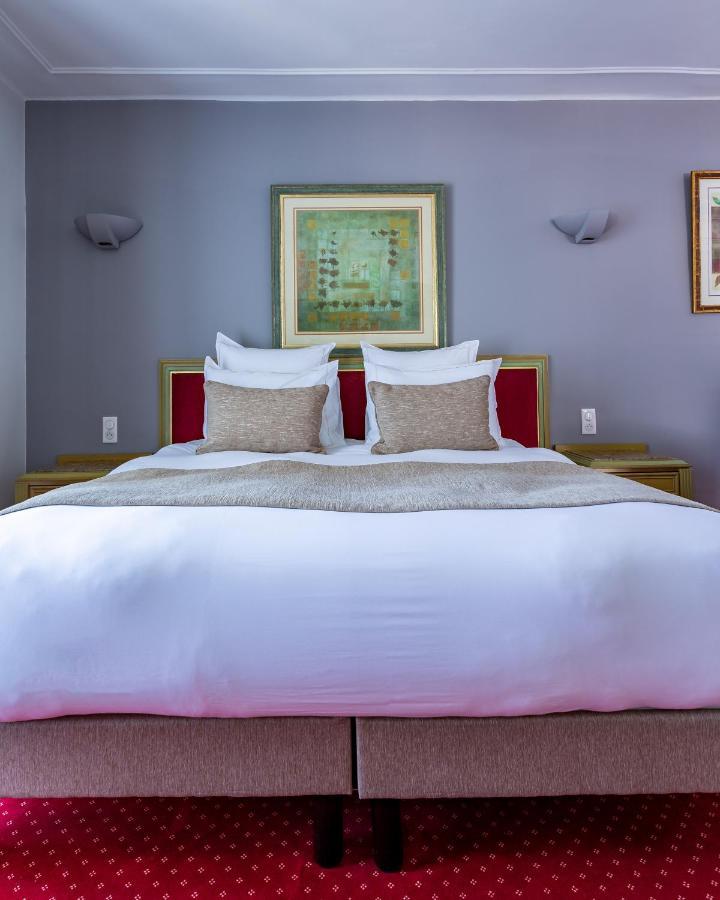 Hotel Restaurant Le Centenaire Les Eyzies Екстер'єр фото