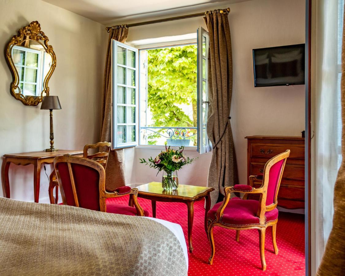 Hotel Restaurant Le Centenaire Les Eyzies Екстер'єр фото